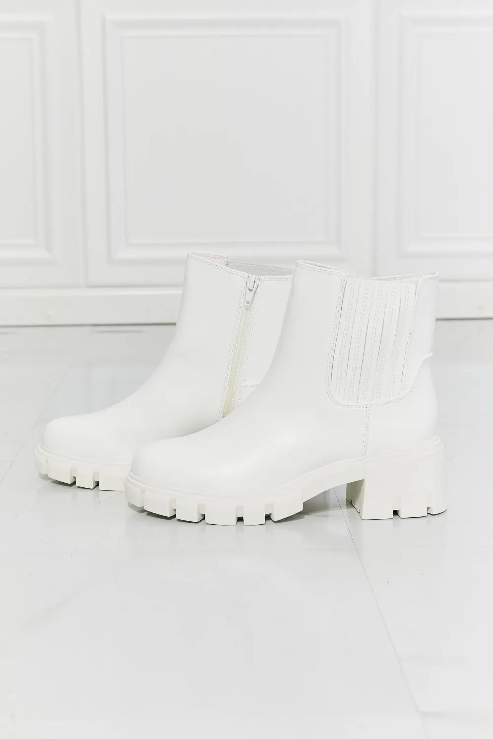 Lug Sole Chelsea Boots in White