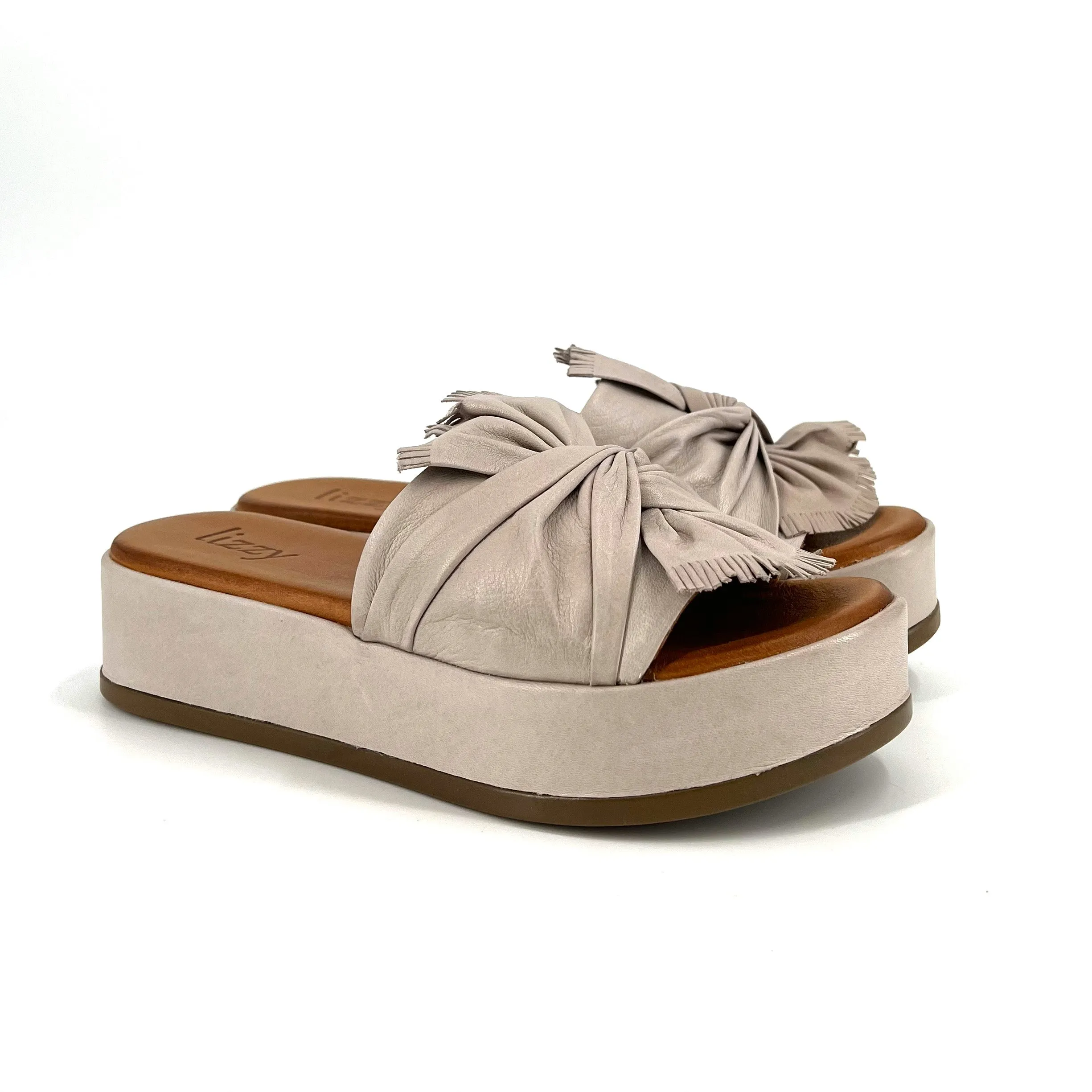 The Knotted Flatform Slide Sandal in Silver Beige